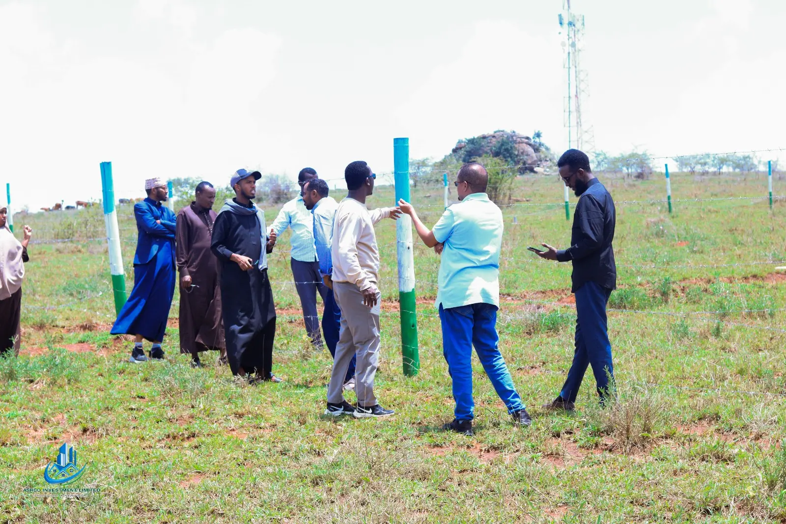 Buyers inspecting a plot boundary